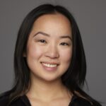 Headshot of Pearl Mei Lam, an Asian American woman in her 20s, with shoulder-lenght hair, smiling at the camera.